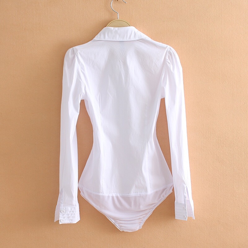 White bodysuit with long sleeves on a beige background