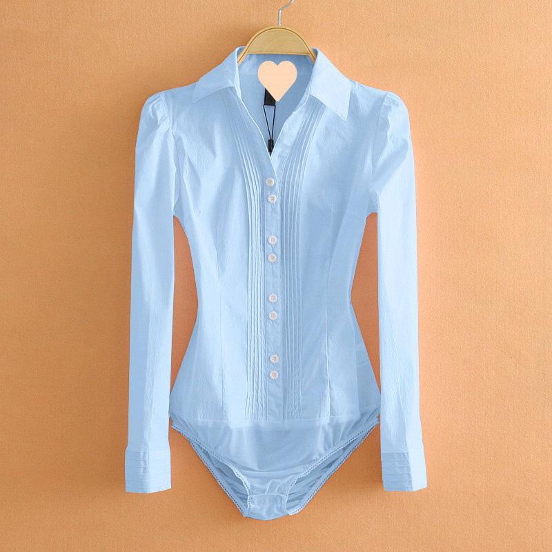 Light blue bodysuit with long sleeves on a hanger against an orange background
