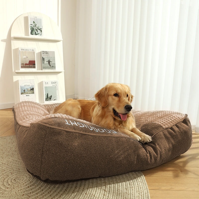 Dog curled up on Huxpaw cloud bed