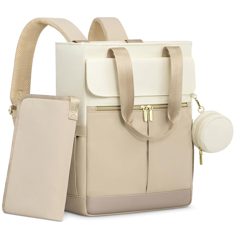 Washable changing pad included with diaper backpack