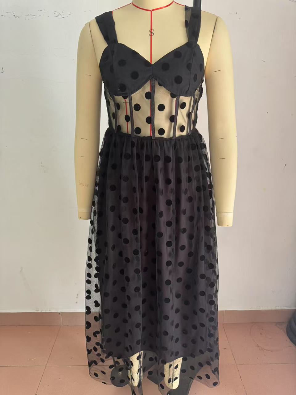 High-waist dotted maxi dress detail