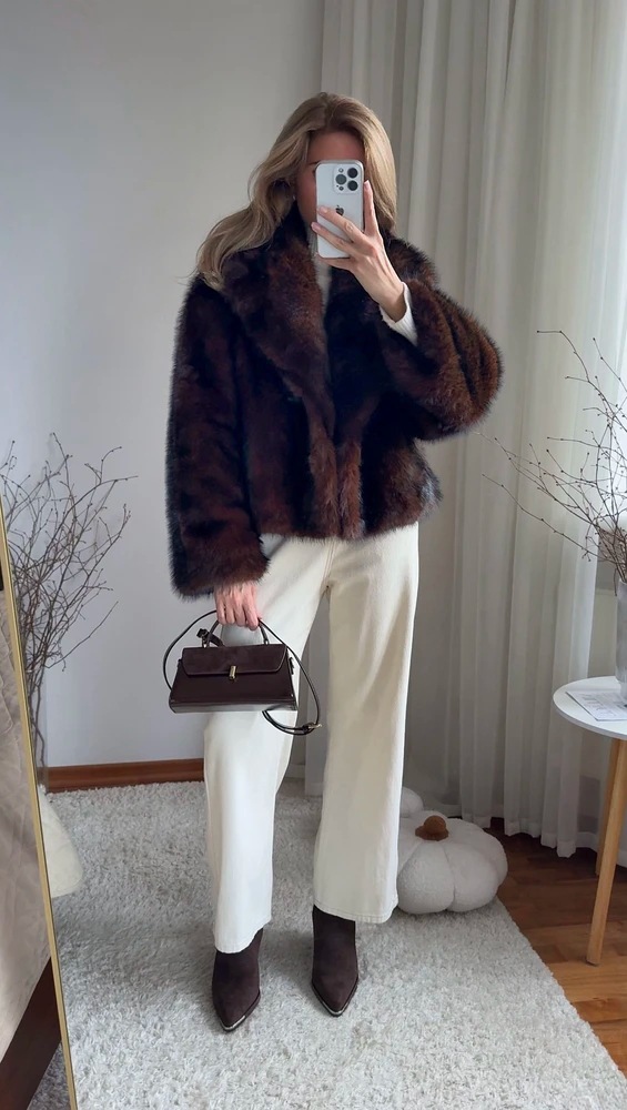Short women's plush outerwear styling