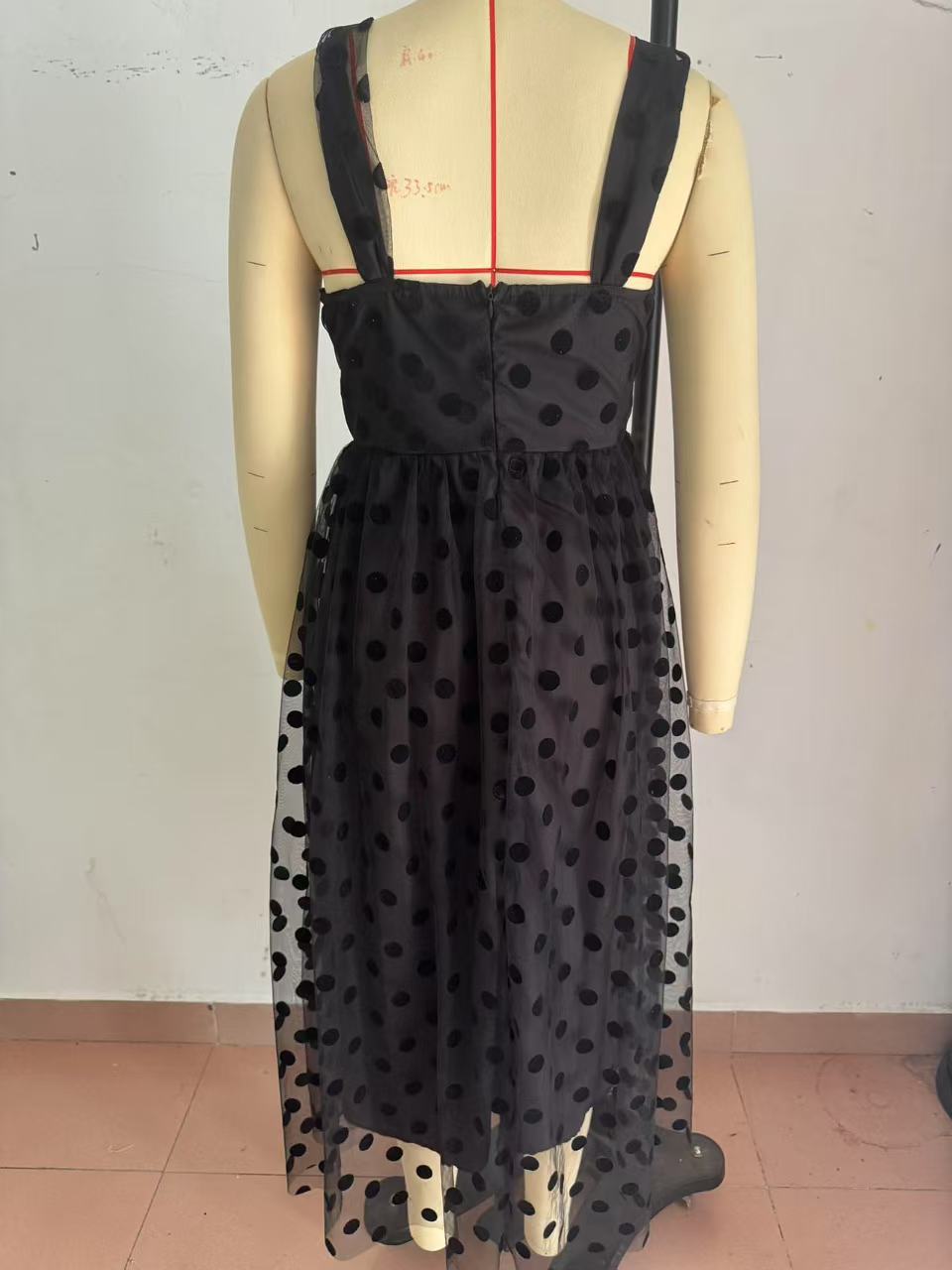 Sleeveless black mesh dress styling