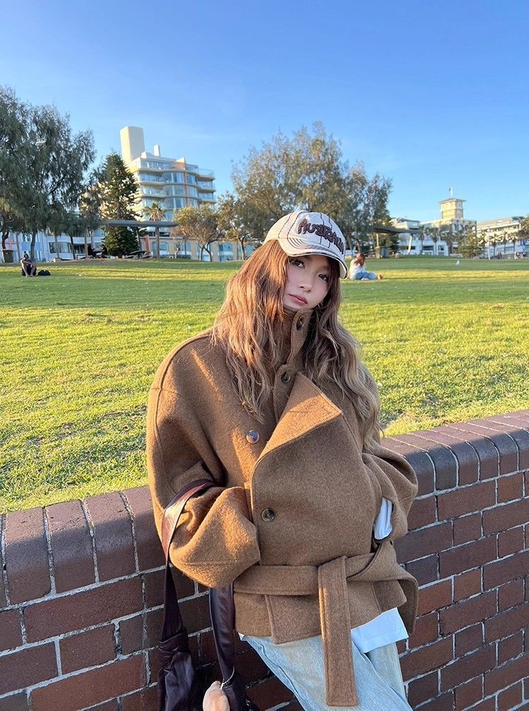 Brown short coat product styling