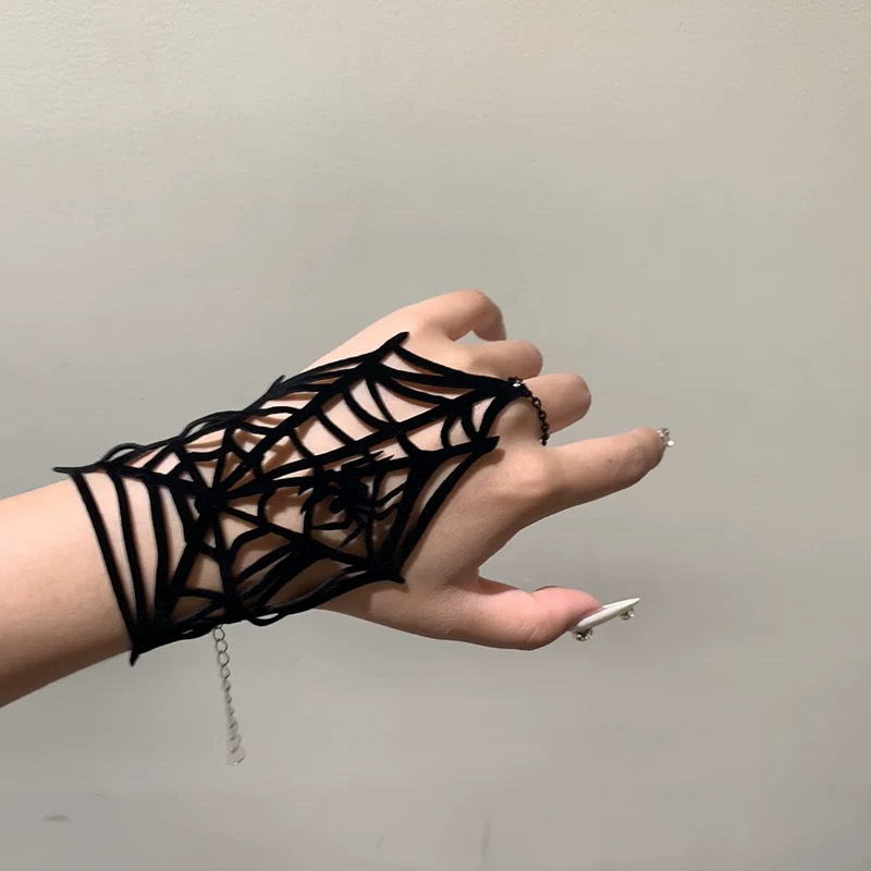 Spider web hand jewelry worn on fingers