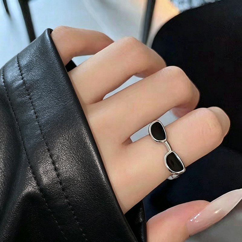 Adjustable ring with open finger opening