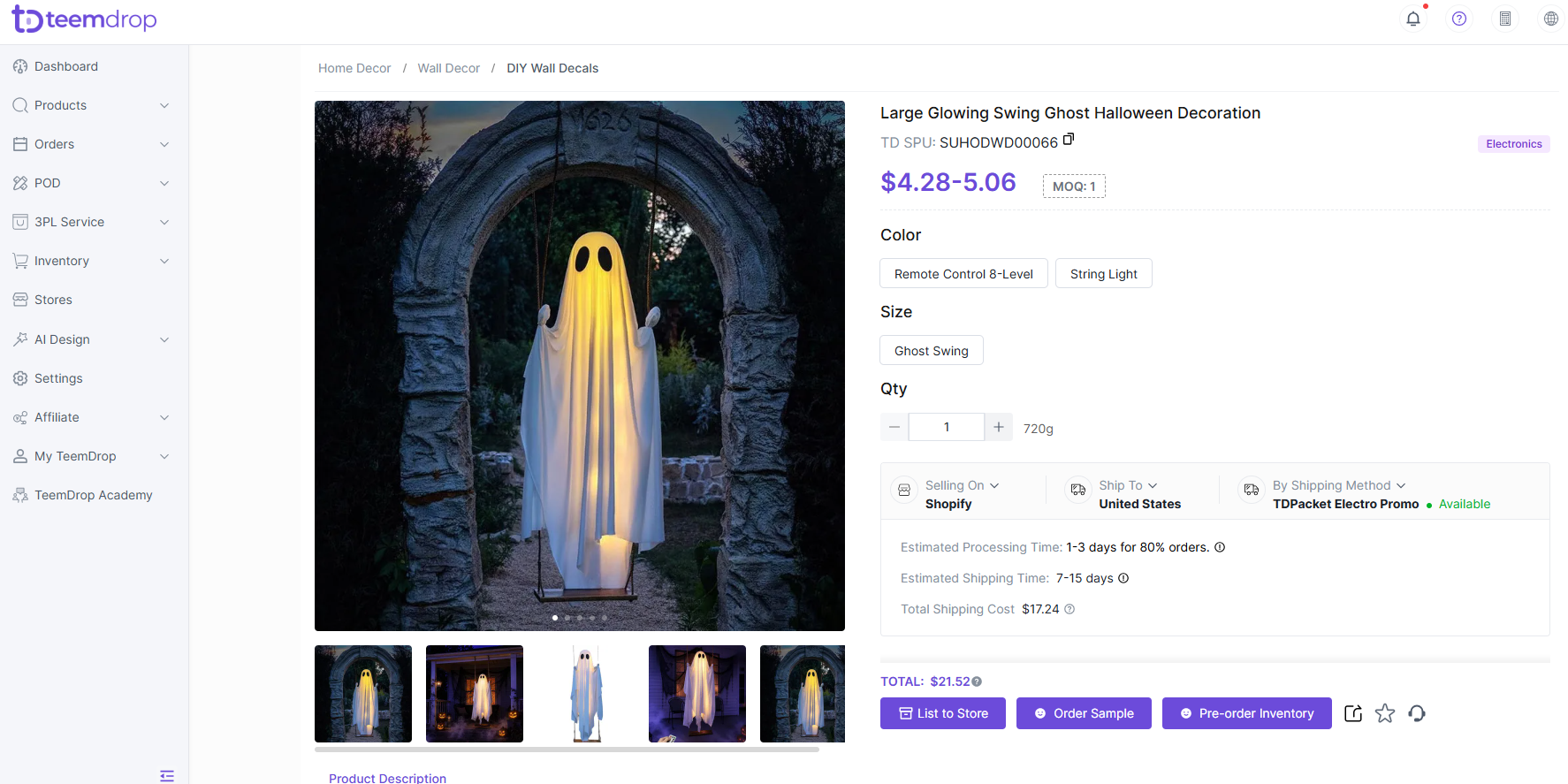 Large glowing ghost Halloween decoration hanging from a swing beneath a stone garden arch at night