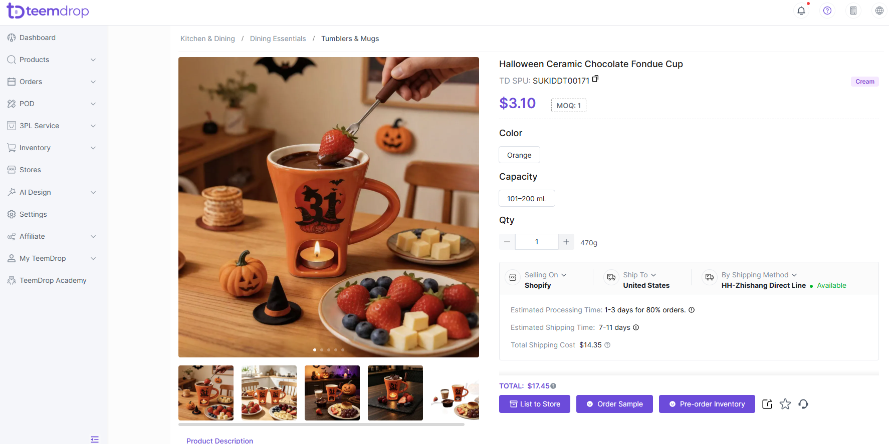 Halloween ceramic chocolate fondue mug with a candle warmer, strawberries, and pumpkin decorations