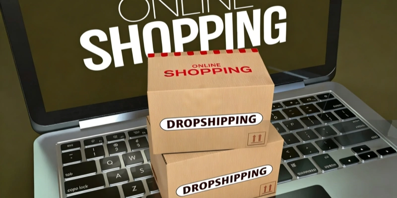 Dropshipping boxes on laptop symbolizing online shopping
