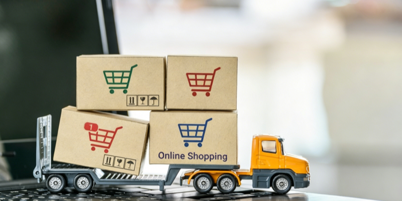 E-commerce online shopping delivery truck cardboard boxes